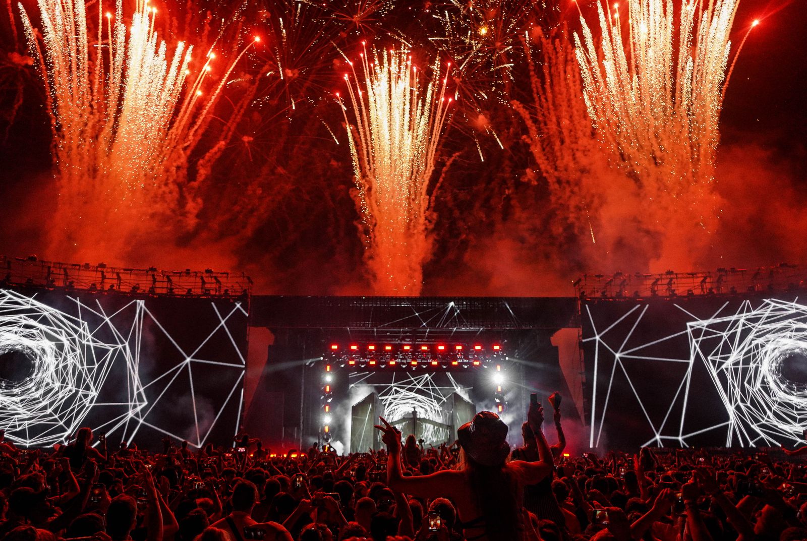 Stage pyrotechnics and flames firing during a live event